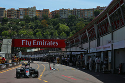 Jenson Button, McLaren MP4-31 leaves pits