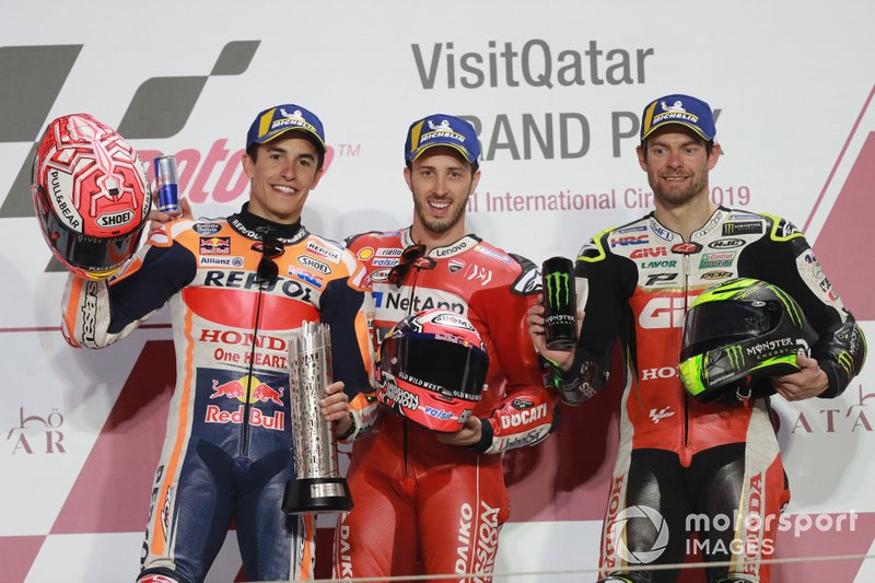 Подіум: друге місце Марк Маркес, Repsol Honda Team, переможець гонки Андреа Довіціозо, Ducati Team, третє місце Кел Кратчлоу, Team LCR Honda