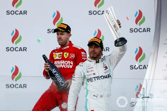 Podio: segundo lugar Lewis Hamilton, Mercedes AMG F1 y tercer lugar Sebastian Vettel, Ferrari