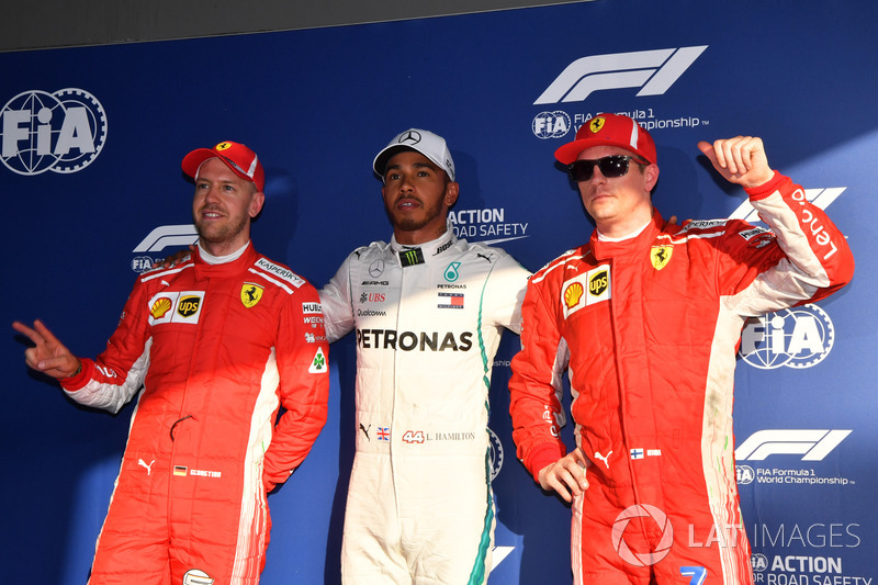 Third place Sebastian Vettel, Ferrari, pole sitter Lewis Hamilton, Mercedes-AMG F1 and second place 