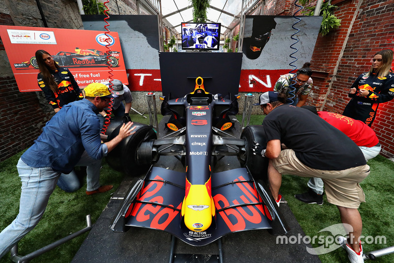 Race fans compete in the Red Bull Racing Pit Stop Challenge