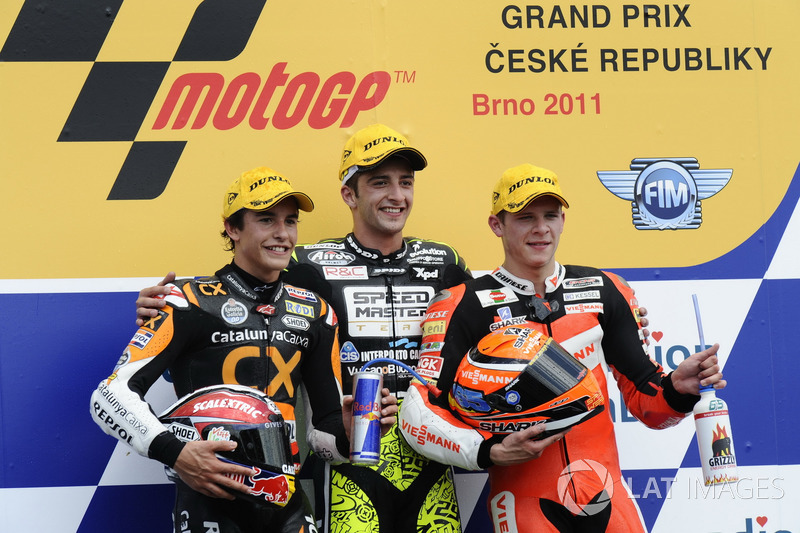 Podium : deuxième place pour Marc Marquez, victoire pour Andrea Iannone, troisième place pour Stefan Bradl