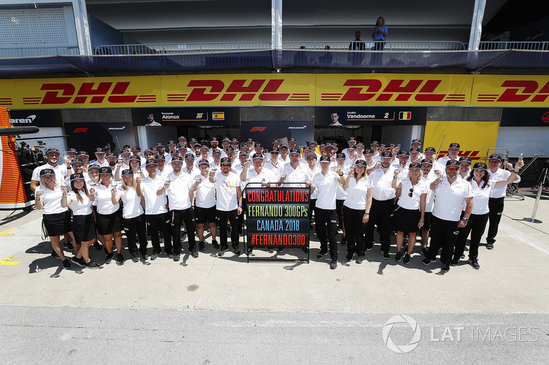 Fernando Alonso, McLaren, raises a glass in celebration of his 300th Grand Prix appearance, with his team, including Zak Brown, Executive Director, McLaren Technology Group, Eric Boullier, Racing Director, McLaren, and Stoffel Vandoorne, McLaren