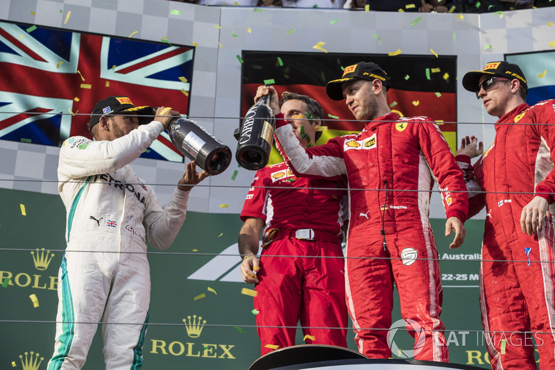 Lewis Hamilton, Mercedes-AMG F1, Inaki Rueda, Ferrari Race Strategist, Sebastian Vettel, Ferrari and Kimi Raikkonen, Ferrari celebrate on the podium with the champagne