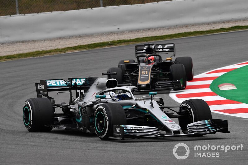 Valtteri Bottas, Mercedes-AMG F1 W10 and Pietro Fittipaldi, Haas VF-19