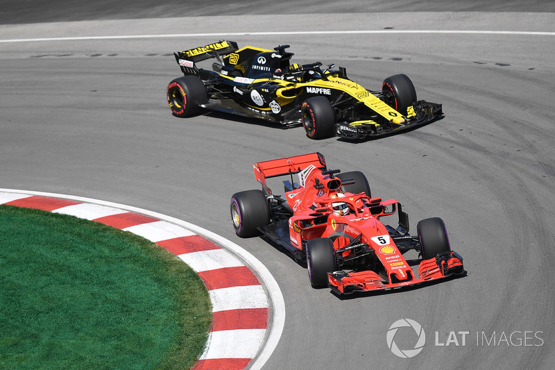 Sebastian Vettel, Ferrari SF71H and Nico Hulkenberg, Renault Sport F1 Team R.S. 18