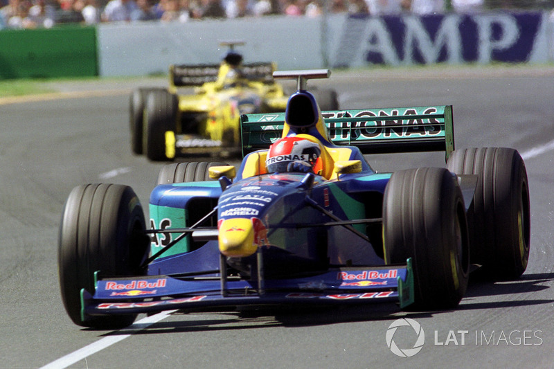 Johnny Herbert, Sauber, leads Damon Hill, Jordan