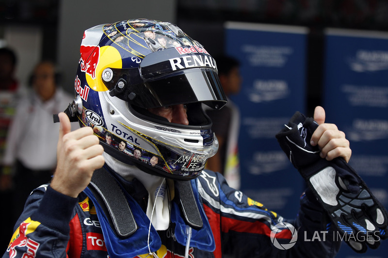 Sebastian Vettel, Red Bull Racing RB7 Renault, celebrates a record pole position