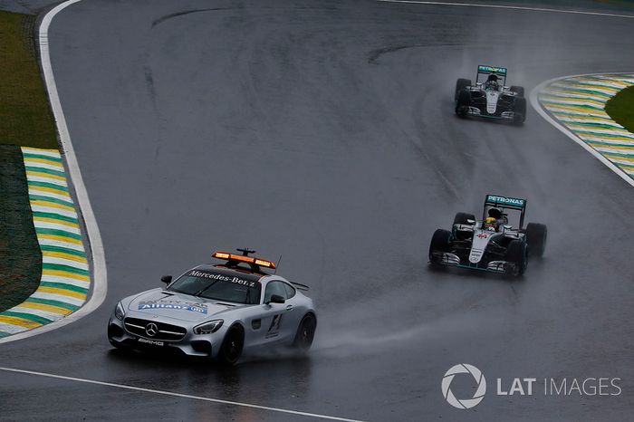 Lewis Hamilton, Mercedes F1 W07 Hybrid, and Nico Rosberg, Mercedes F1 W07 Hybrid, behind the Safety 