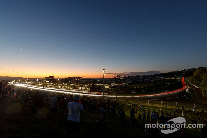 Track action at sunset