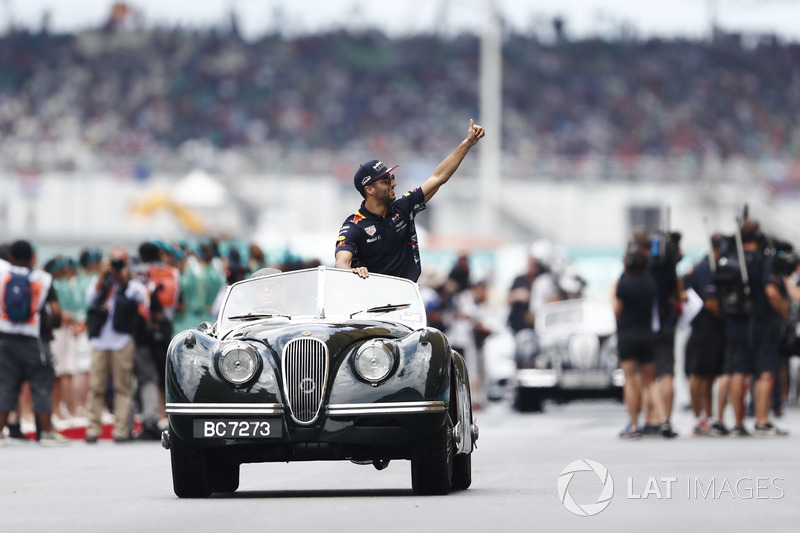 Daniel Ricciardo, Red Bull Racing, waves from a Jaguar XK on the drivers parade