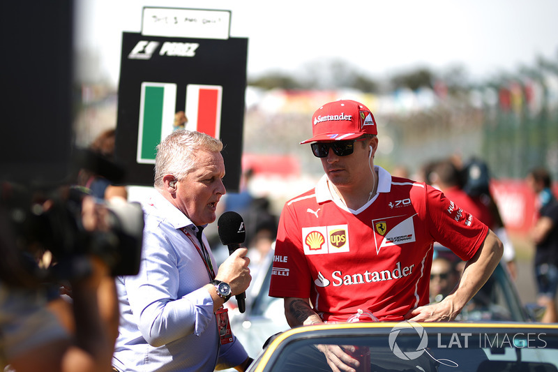 Kimi Raikkonen, Ferrari talks with Johnny Herbert, Sky TV on the drivers parade