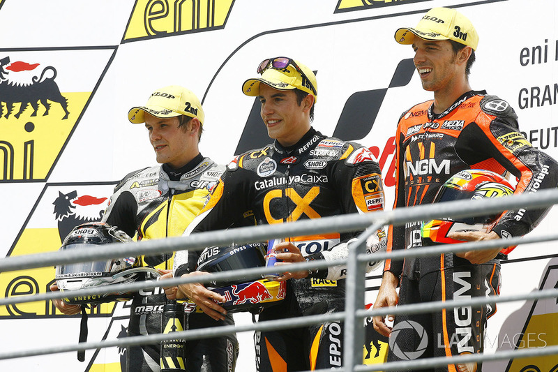 Podium: 1. Marc Marquez, 2. Stefan Bradl, 3. Alex de Angelis