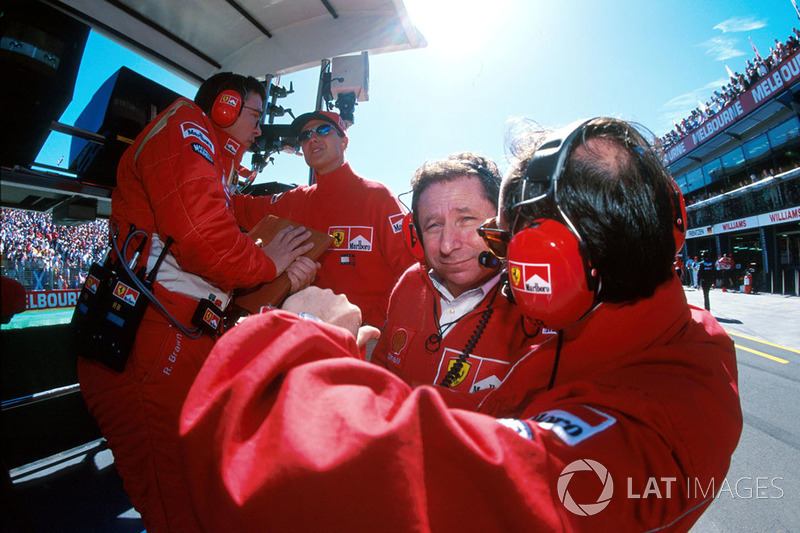 Ferrari team personnel on the pitwall: Ross Brawn, Ferrari Technical Director, Michael Schumacher, F