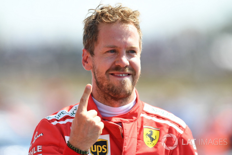 Il vincitore della gara Sebastian Vettel, Ferrari SF71H, festeggia nel parco chiuso