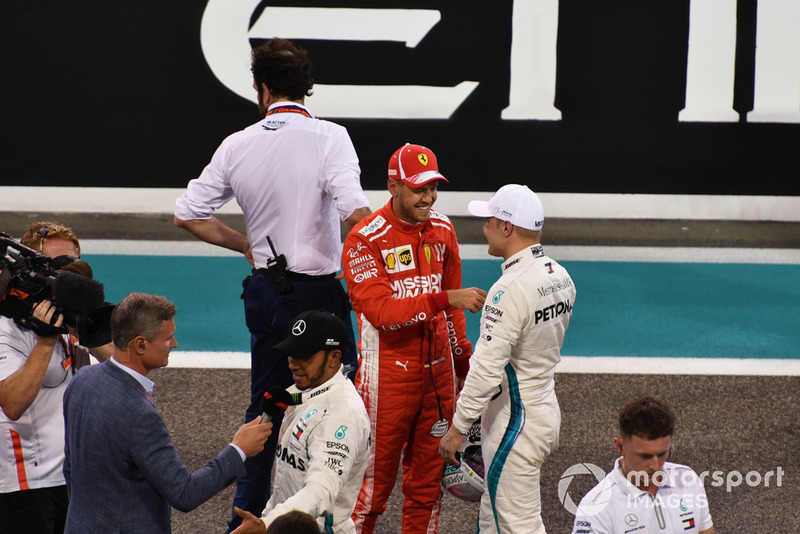 Sebastian Vettel, Ferrari e Valtteri Bottas, Mercedes AMG F1, nel parco chiuso
