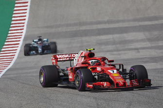 Kimi Raikkonen, Ferrari SF71H, leads Lewis Hamilton, Mercedes AMG F1 W09 EQ Power+