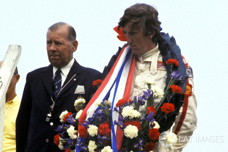 Podium: race winnaar Jochen Rindt, Lotus