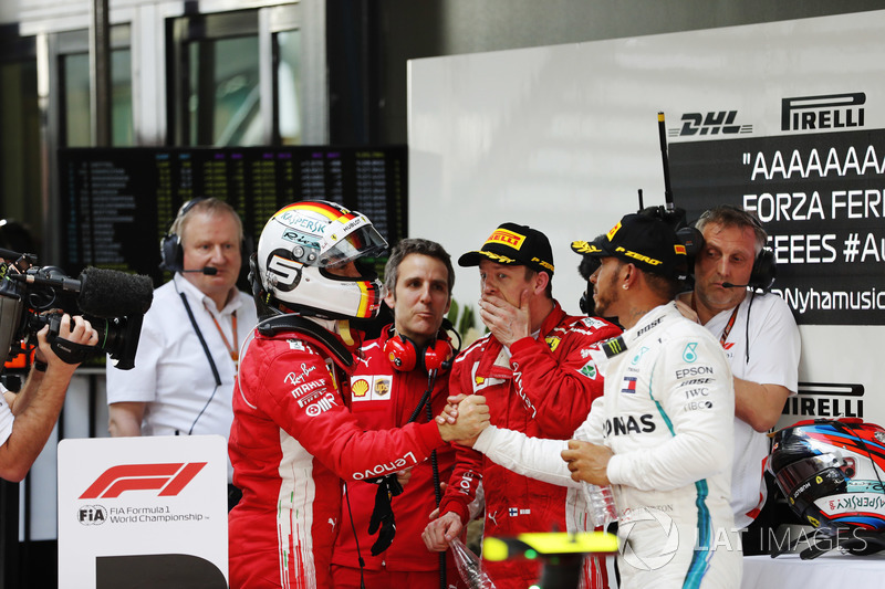 Sebastian Vettel, Lewis Hamilton, dan Kimi Raikkonen usai balapan
