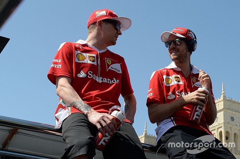 Kimi Raikkonen, Scuderia Ferrari and team-mate Sebastian Vettel, Scuderia Ferrari