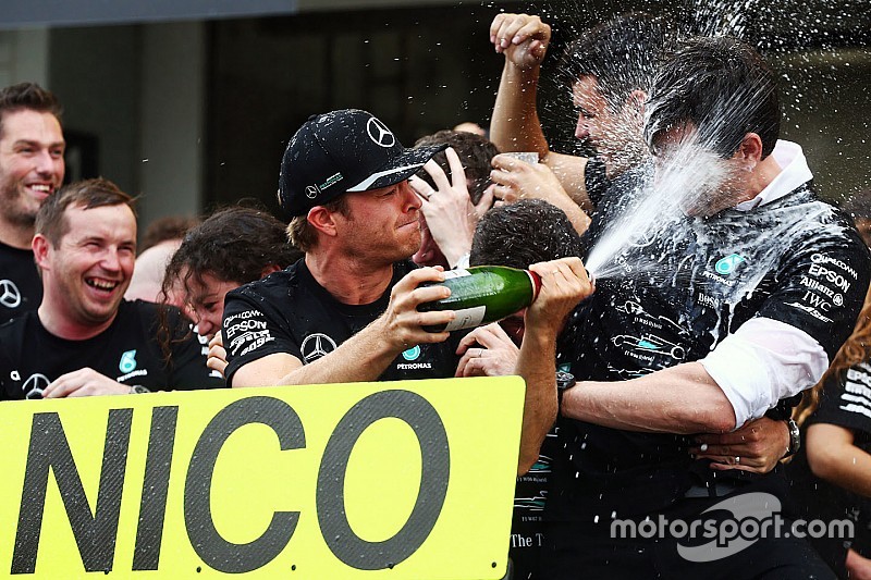 Race winner Nico Rosberg, Mercedes AMG F1 celebrates winning the constructors' championship with Toto Wolff, Mercedes AMG F1 Shareholder and Executive Director and the team