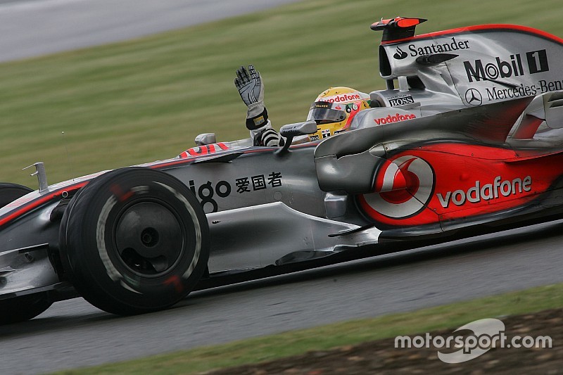 Race winner Lewis Hamilton celebrates