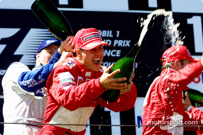 Ralf Schumacher, Michael Schumacher y Rubens Barrichello en el podio