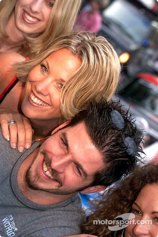 A happy Patrick Carpentier and the Molson Indy Girls