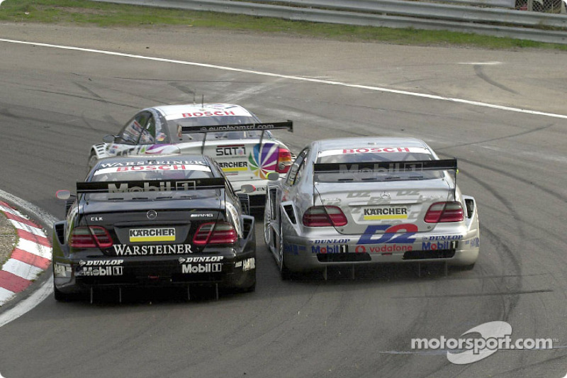 Acción cercana de carrera: Uwe Alzen y Bernd Schneider