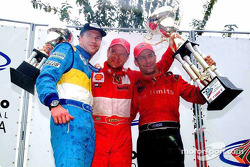 The podium: race winners Mario Haberfeld, Rubens Barrichello and Tony Kanaan