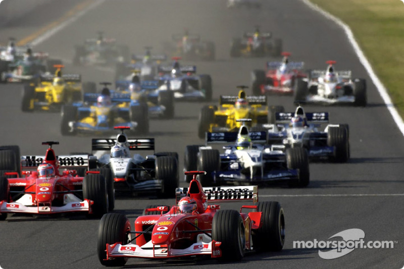 The start: Michael Schumacher takes the lead in front of Rubens Barrichello