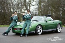 Mark Webber and Antonio Pizzonia pose with the James Bond 007 XK-R during a photoshoot at the Jaguar Racing headquarters in Milton Keynes