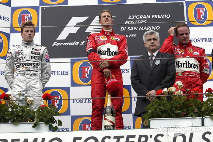 Podio: el ganador Michael Schumacher, Kimi Raikkonen y Rubens Barrichello
