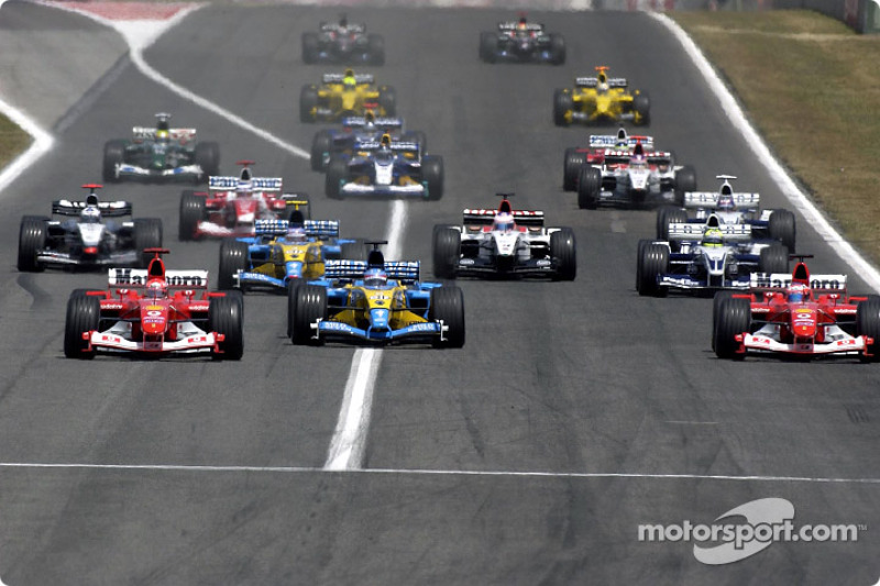 The start: Michael Schumacher takes the lead ahead of Fernando Alonso and Rubens Barrichello