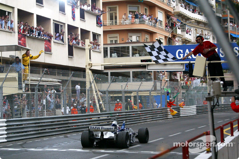 Juan Pablo Montoya takes the checkered flag