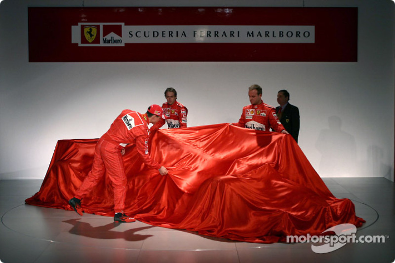 Michael Schumacher, Luca Badoer and Rubens Barrichello unveil the new Ferrari F2004