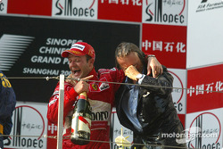Podium: champagne for Rubens Barrichello and Luca di Montezemelo
