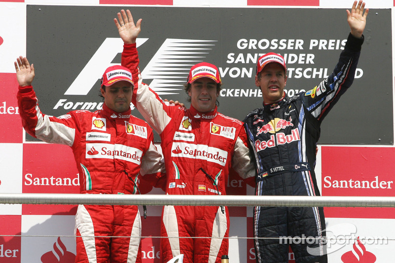 Podium: race winner Fernando Alonso, Scuderia Ferrari, second place Felipe Massa, Scuderia Ferrari, third place Sebastian Vettel, Red Bull Racing