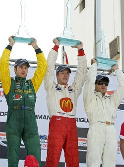 Podium: race winner Sébastien Bourdais with Will Power and Oriol Servia