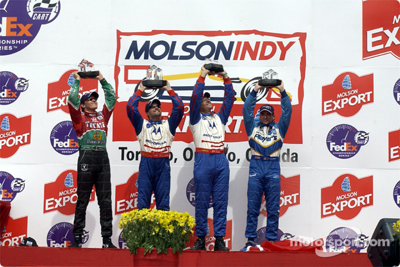 The podium: Adrian Fernandez, Michael Andretti and Alex Tagliani