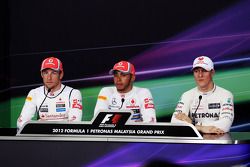 The qualifying top 3 FIA Press Conference Jenson Button, McLaren Mercedes; pole sitter Lewis Hamilton, McLaren Mercedes and Michael Schumacher, Mercedes GP