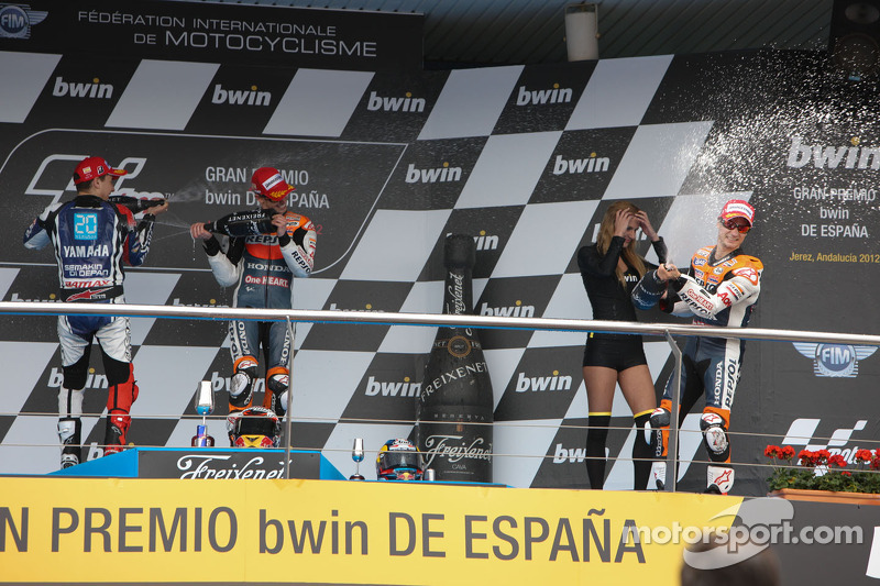 2012 Podio: ganador de la carrera Casey Stoner, del equipo Repsol Honda, segundo lugar Jorge Lorenzo, Yamaha Factory Team, y tercer lugar Dani Pedrosa, Repsol Honda Team