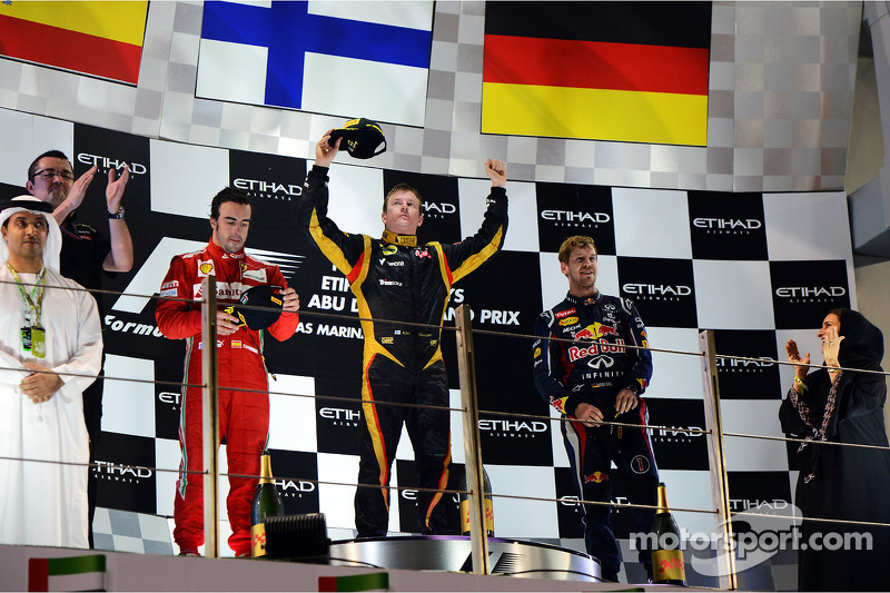 The podium: second place Fernando Alonso, Ferrari, race winner Kimi Raikkonen, Lotus F1 Team, third place Sebastian Vettel, Red Bull Racing