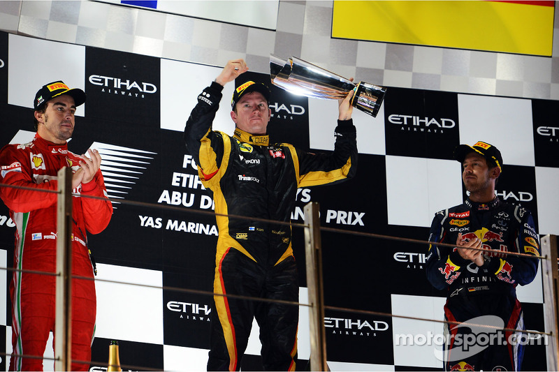 The podium: second place Fernando Alonso, Ferrari, race winner Kimi Raikkonen, Lotus F1 Team, third place Sebastian Vettel, Red Bull Racing