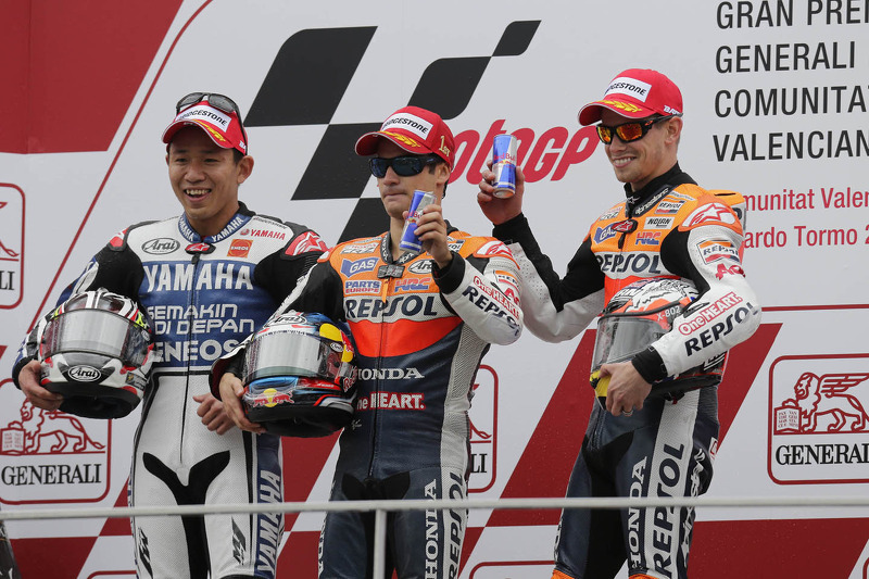 Podium : le vainqueur Dani Pedrosa, le deuxième Katsuyuki Nakasuga, le troisième Casey Stoner