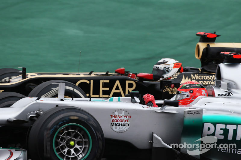 Michael Schumacher, Mercedes AMG F1, e Kimi Raikkonen, Lotus F1