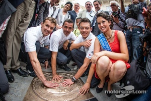 Hand imprint ceremony: 2012 24 Hours of Le Mans winners Marcel Fässler, Andre Lotterer and Benoit Tréluyer with Miss 24 Hours Le Mans 2013