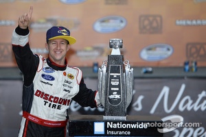 Race winner A.J. Allmendinger celebrates