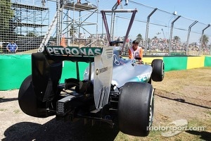 The Mercedes AMG F1 W05 of Lewis Hamilton, Mercedes AMG F1 is craned from the circuit after he stopped on the out lap of FP1