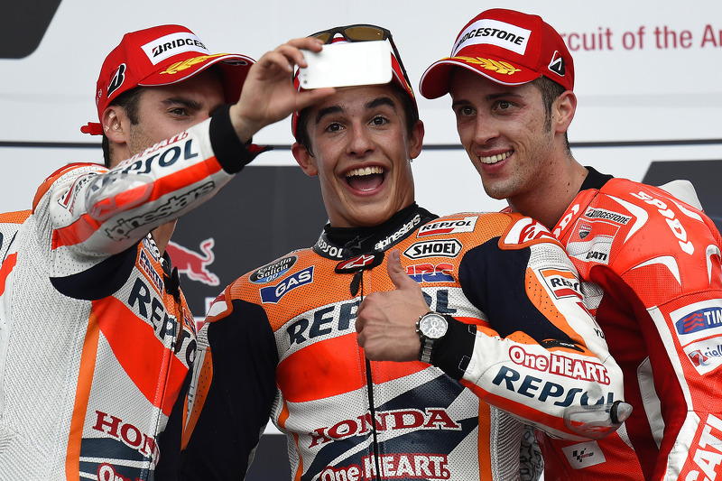 Podio: 1º Marc Márquez, 2º Dani Pedrosa, 3º Andrea Dovizioso